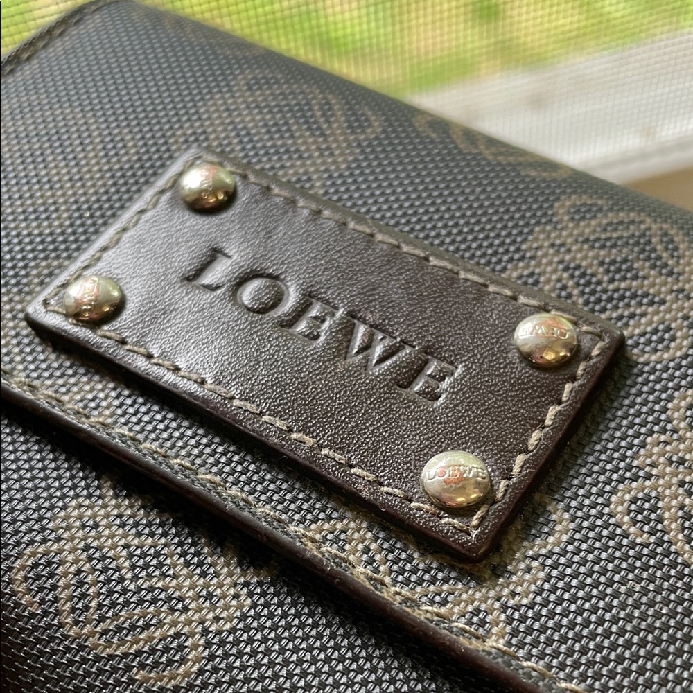 Authentic Loewe Anagram Trifold Wallet kiss-lock closure